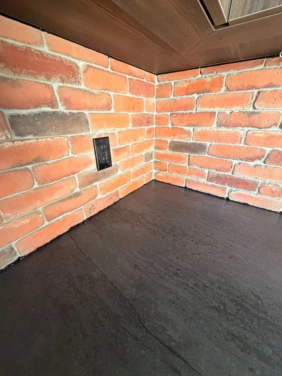 renovated modern kitchen with brick backspash