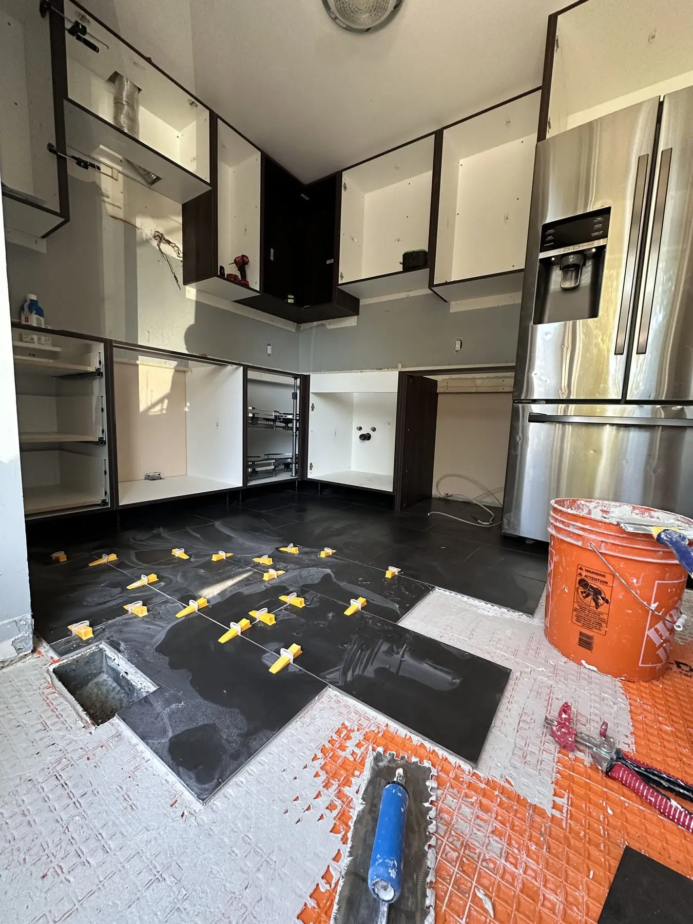 tile installation for kitchen in process